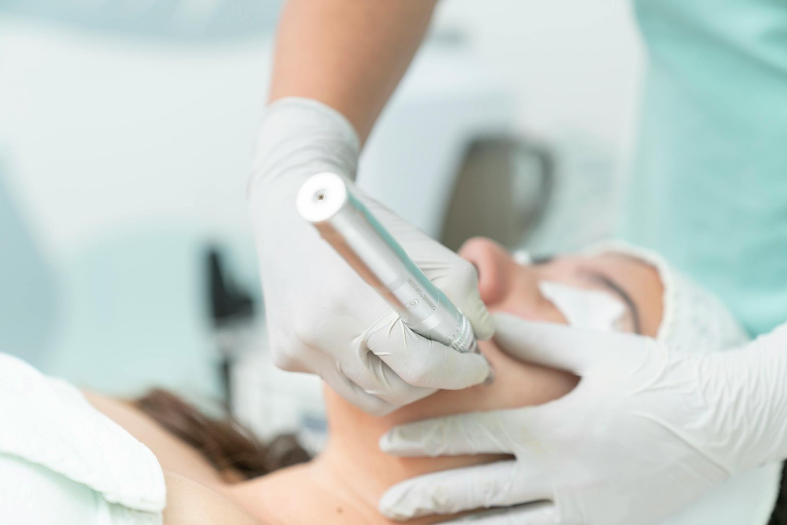 Image of aesthetician providing skin care services.